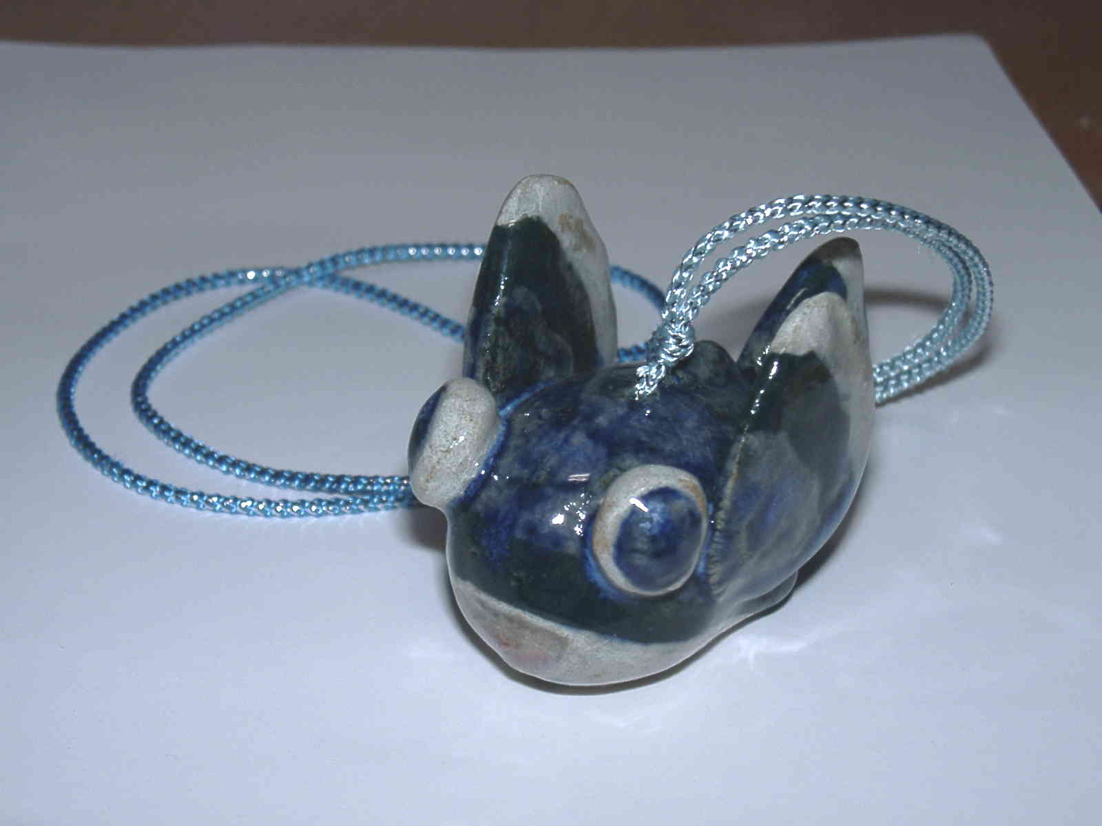 a ago shaped ringer made from ceramics